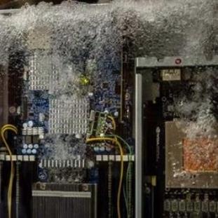 Machine submerged in cooling liquid