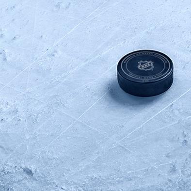 NHL Hockey puck resting on ice
