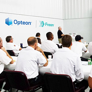People sitting in an Opteon/Freon classroom