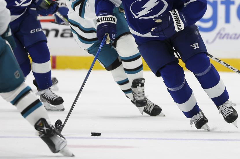 NHL hockey players playing on ice