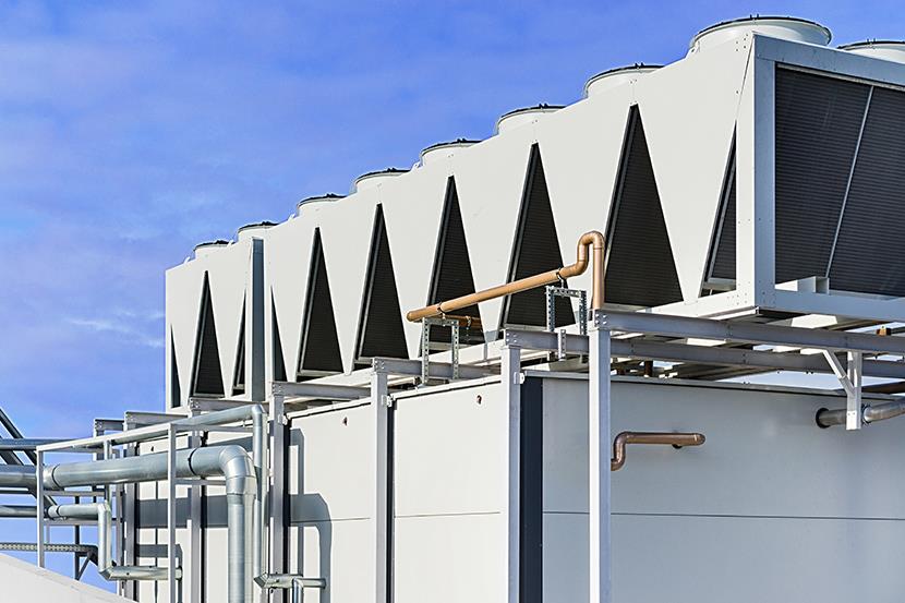 pipes leading to series of ventillation chillers system outside