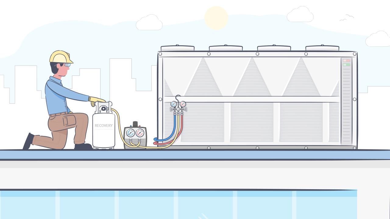 Technician using a recovery tank on a commercial buildings AC unit